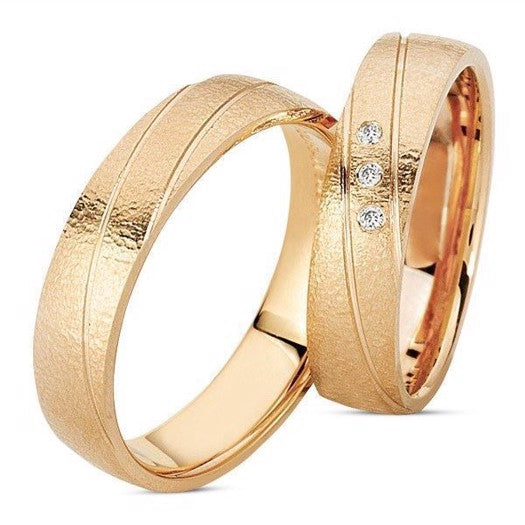 Eksklusive Nuran vielsesringe i 14 karat rosaguld med 3 x 0,01 ct diamanter
