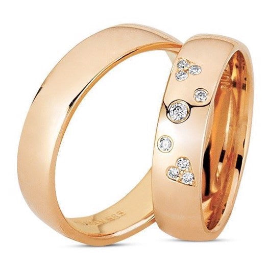 Smukke Nuran vielsesringe i 14 kt guld med 9 x 0,10 ct diamanter