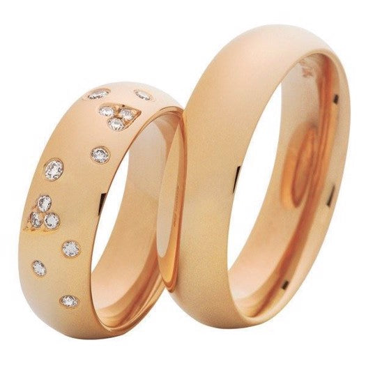 Smukke Nuran vielsesringe i 14 karat rosaguld med 0,17 ct diamanter