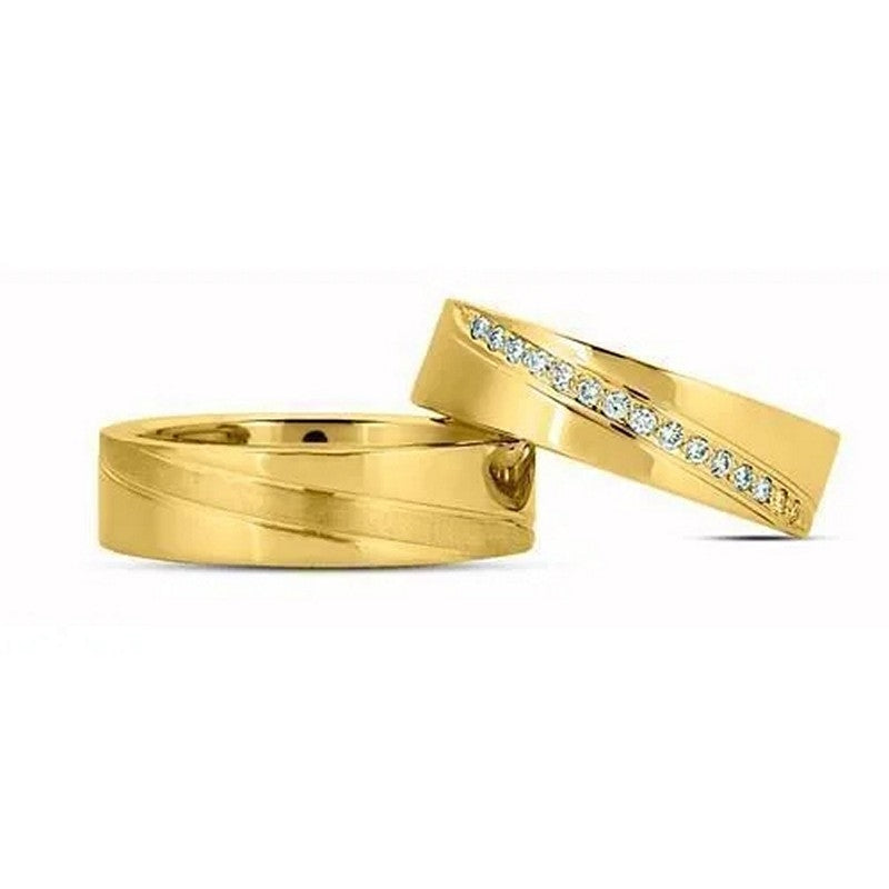 Smukke Nuran vielsesringe i 8 eller 14 karat guld med 15 pavé-satte diamanter på damering og silkemat skråsnit på herrering.