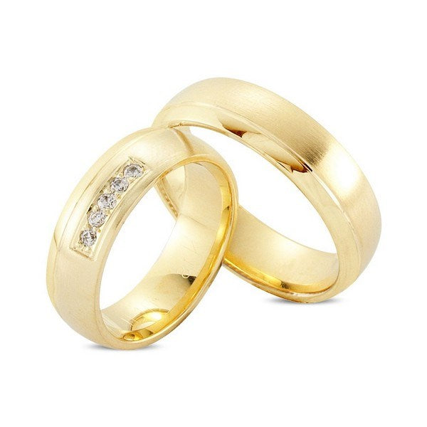 Smukke Nuran vielsesringe i 8 kt guld med 0,10 ct diamanter