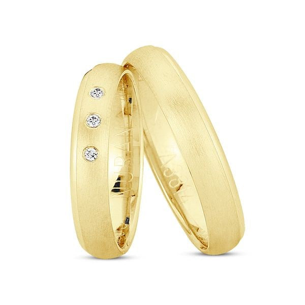 Nuran vielsesringe i 8 eller 14 karat guld med 3 x 0,01 ct diamanter