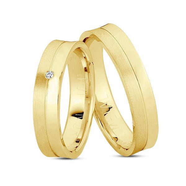 Nuran vielsesringe i 8 eller 14 karat guld med 0,01 ct diamant