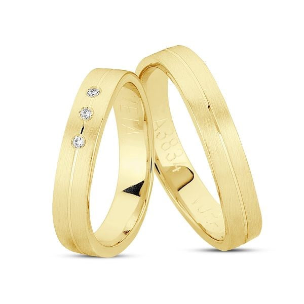 Nuran vielsesringe i 8 eller 14 karat guld med 0,03 ct diamanter
