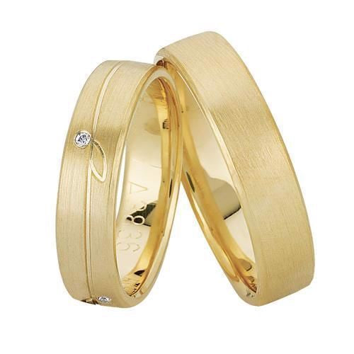 Unikke Nuran vielsesringe i 8 eller 14 karat guld med 0,04 ct diamanter og bladdetalje