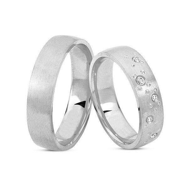 Unikke Nuran vielsesringe i 14 karat hvidguld med 0,08 ct diamanter og boblegravering