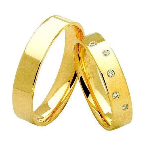 Tidløse Nuran vielsesringe i 14 karat guld med 5 diamanter på 0,05 ct – blanke ringe, 4,5 mm brede.