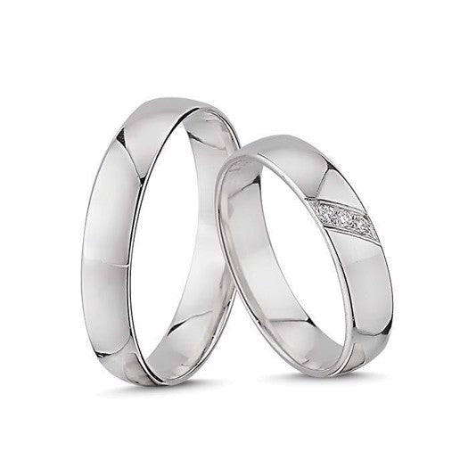 Tidløse Nuran vielsesringe i 14 kt hvidguld med 0,03 ct diamanter – sæt med damering og herrering.