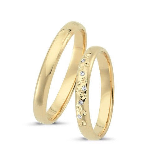 Fortryllende Nuran vielsesringe i 14 kt guld med 5 diamanter