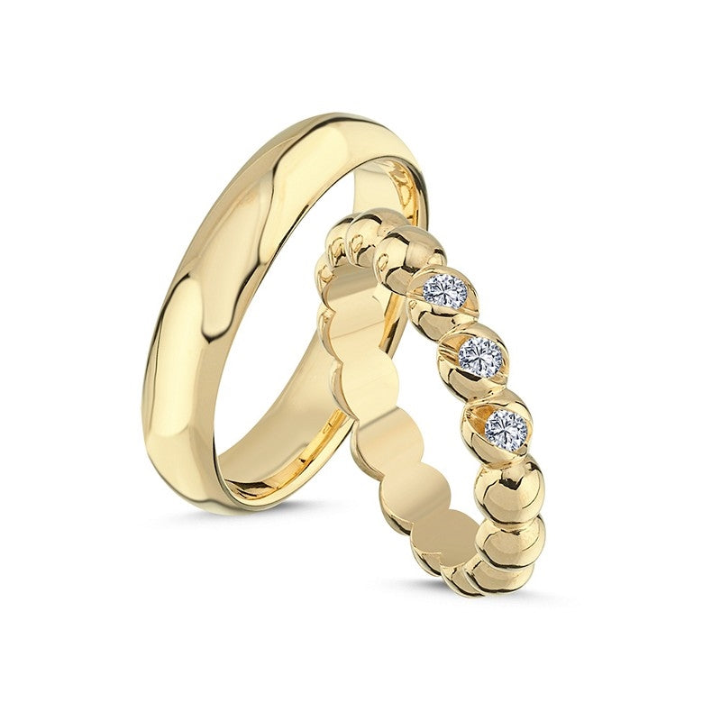Unikke Nuran vielsesringe i 14 kt guld med 0,15 ct diamanter