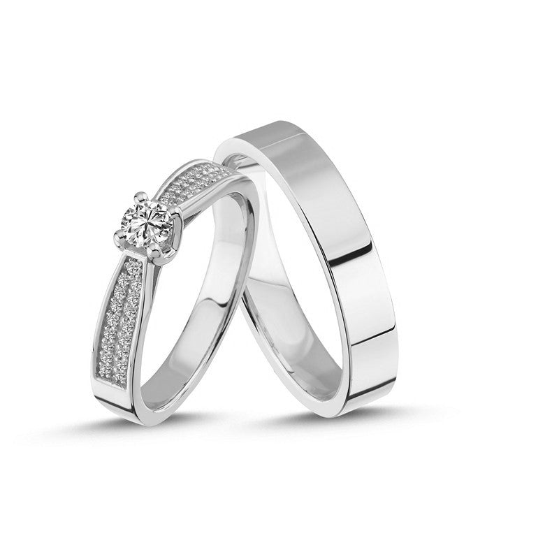 Exklusivt Nuran vielsesringesæt i 14 karat hvidguld med 0,60 ct diamanter – dame- og herrering.