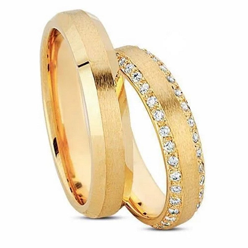 Eksklusiv Nuran vielsesringe i 8 eller 14 karat guld med rundet profil og damering med 70 x 0,01 ct diamanter i silkemat finish.