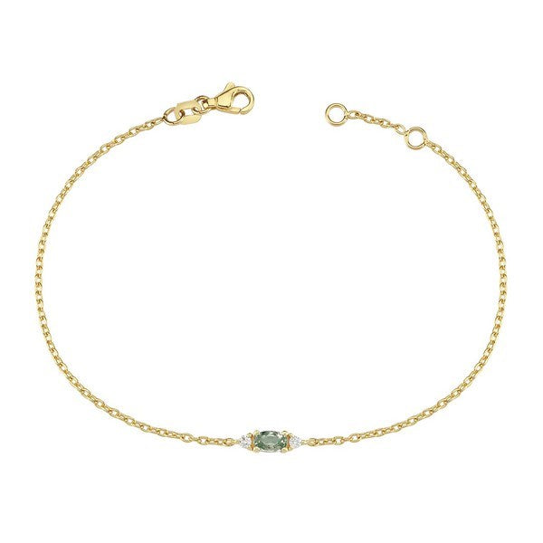 Petit armbånd i 14 kt guld med oval grøn safir og diamanter fra Nuran.