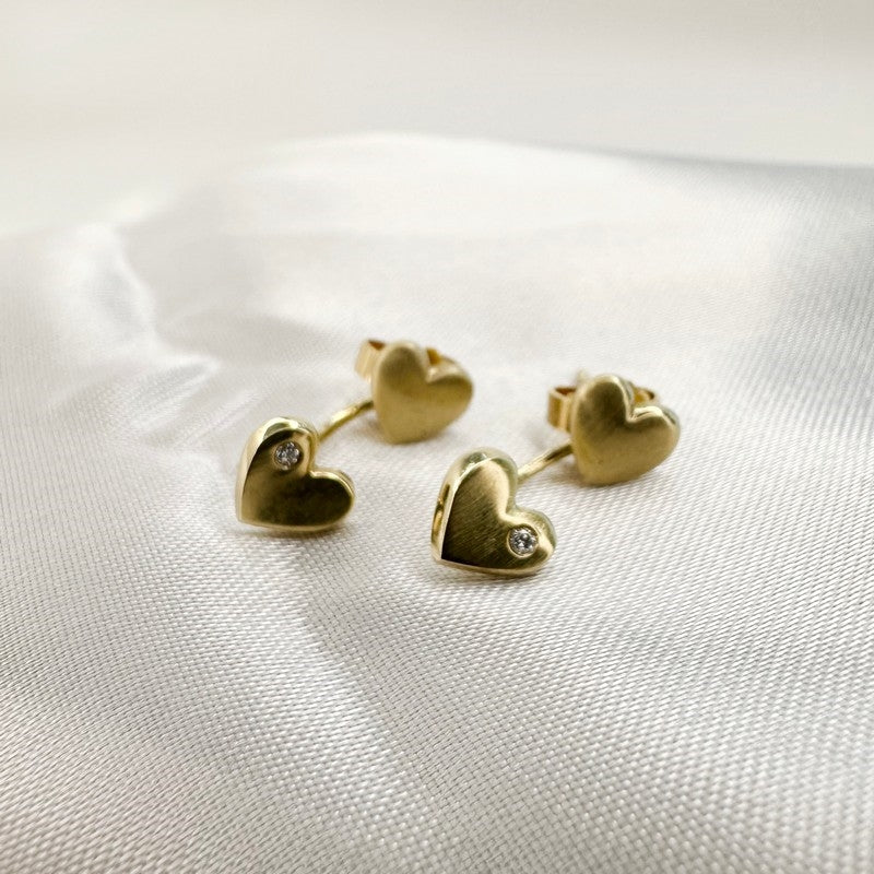Nuran øreringe i 14 karat guld med hjerter og 0,02 ct diamanter