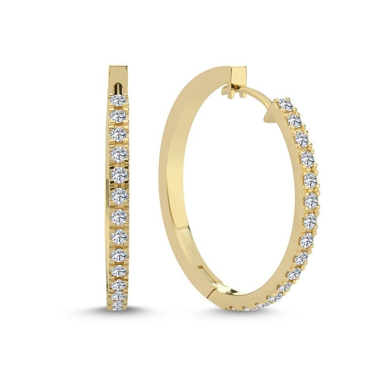 Nuran creoler i 14 karat guld med 0,60 ct diamanter Ø27