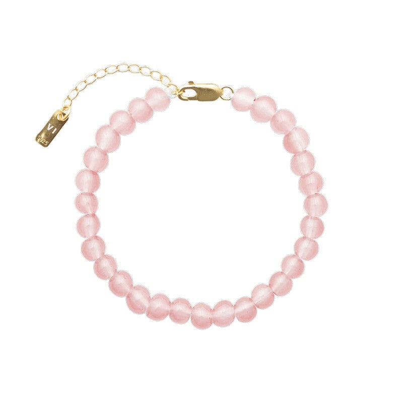 House of Vincent Candy Coral Blossom armbånd i forgyldt sølv med runde pink krystalperler, justerbar 16–19 cm.