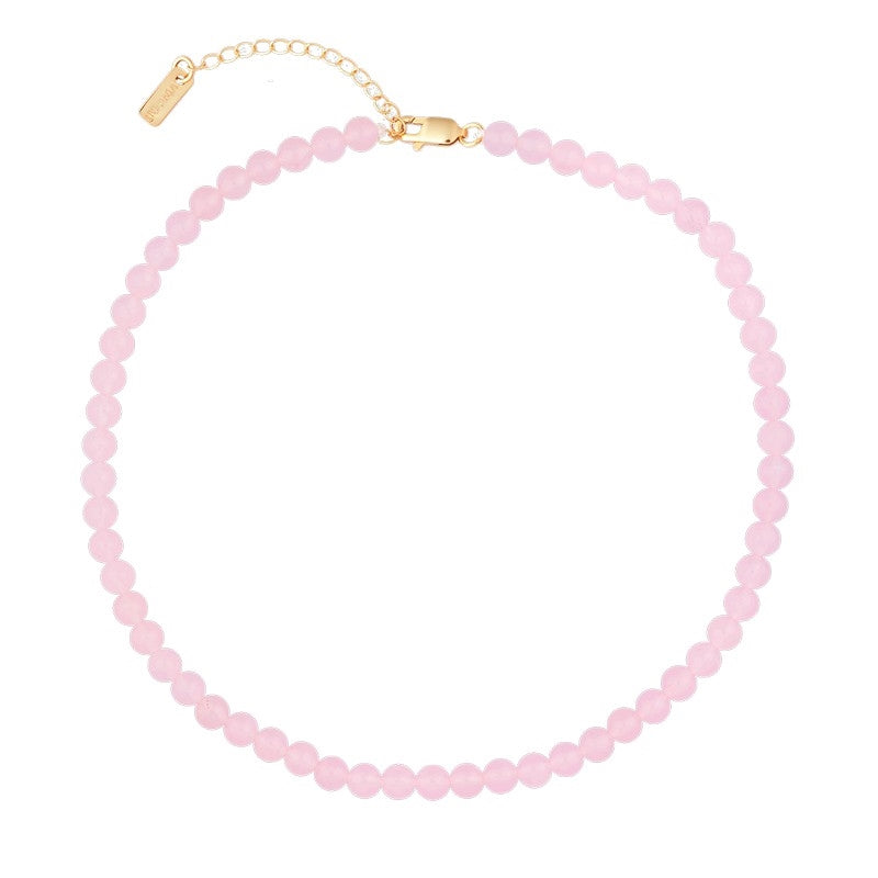 Candy Coral Blossom halskæde i forgyldt sølv med lyserøde runde perler 37–42 cm fra House of Vincent.