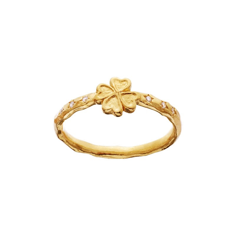 Maanesten Clover Ring i 18 karat forgyldt sterlingsølv med firkløver og hvide zirkonia.