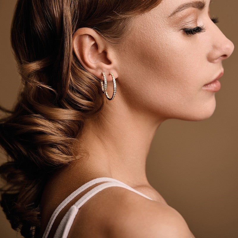 Nuran creoler i 14 karat guld med 0,68 ct diamanter Ø30