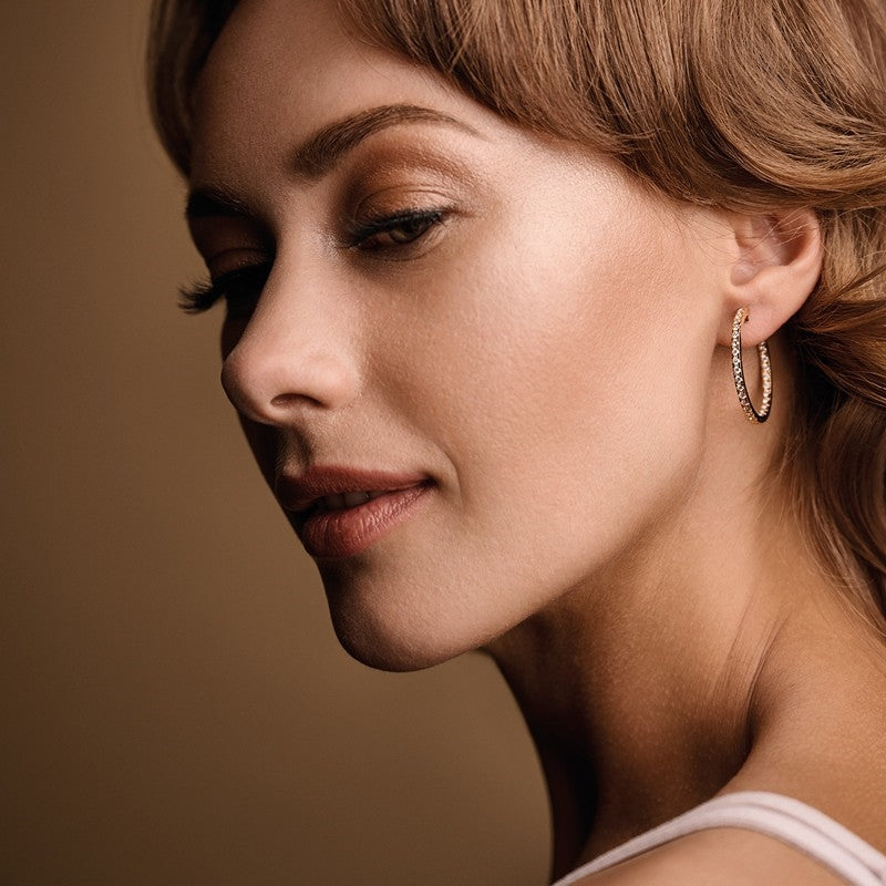 Nuran creoler i 14 karat guld med 0,52 ct diamanter Ø23