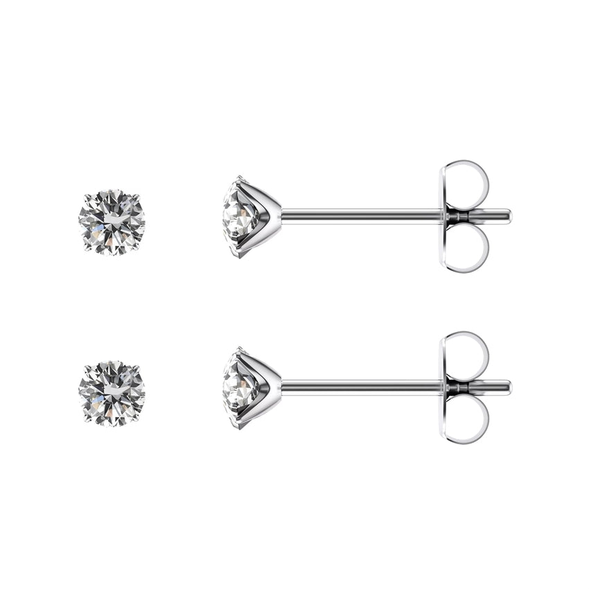 Titanium ørestikker med 3 mm klare facetslebne sten fra Guldcenter i rund form med sommerfuglelås.