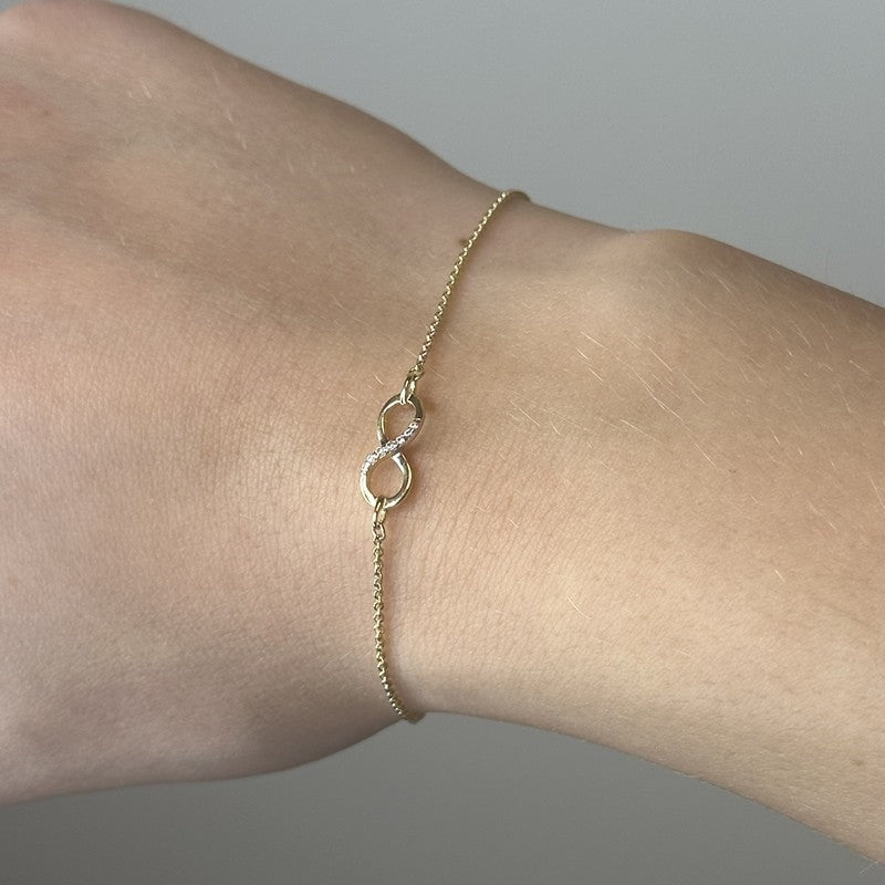 Evigheds armbånd i 8 kt guld med zirkonia 17,5+2 cm – Smykkecenter