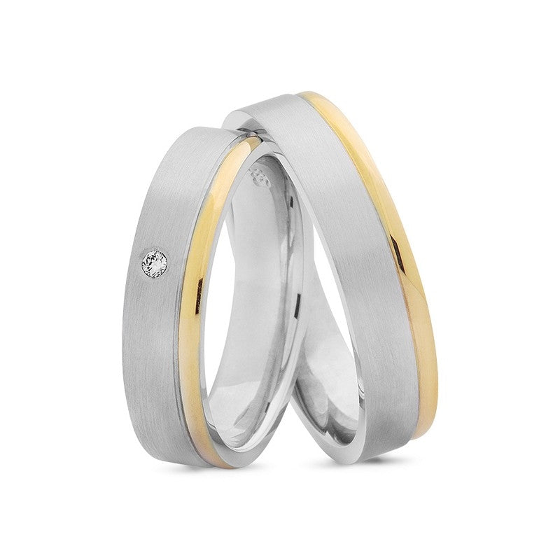 Smukke Nuran vielsesringe i 14 kt guld og hvidguld med silkemat overflade, 5 mm bredde, dame med 0,02 ct diamant og herre uden sten.
