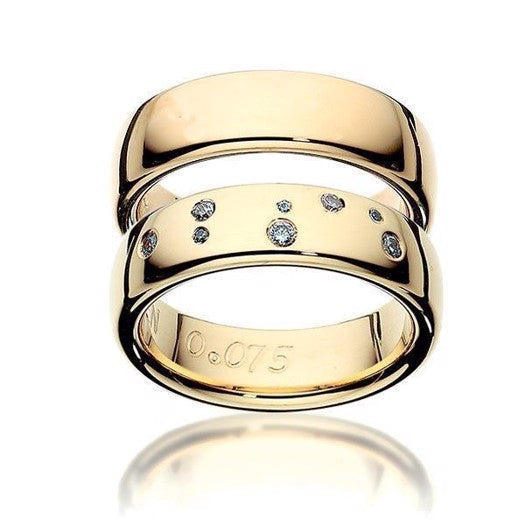 Eksklusive Scrouples vielsesringe i 14 eller 8 karat blankt guld med løvens stjernebillede og diamanter.