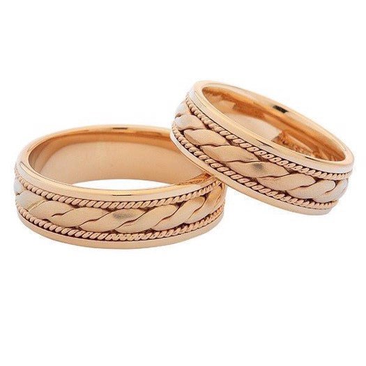Eksklusiv Nuran vielsesringe i 14 karat rosa guld med flettet mønster og 5 mm bredde.