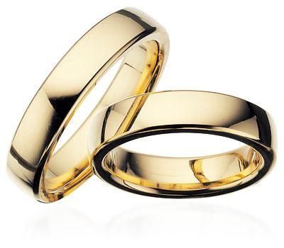 Scrouples vielsesringe i guld med diamant – detalje af fatning