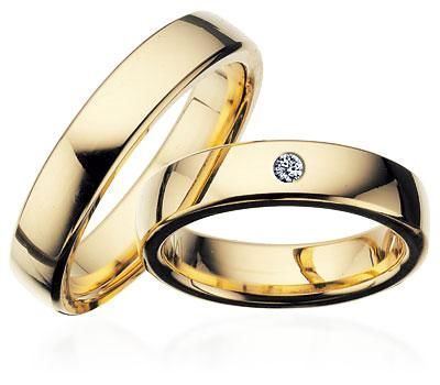 Scrouples vielsesringe i guld med diamant – detalje af fatning