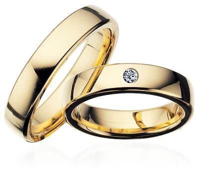 Scrouples vielsesringe i guld med diamant – detalje af fatning