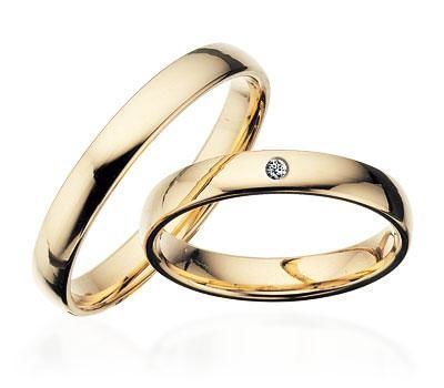 Scrouples vielsesringe i guld med diamant – nærbillede af sten