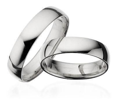 Scrouples klassiske vielsesringe i sterlingsølv 5 mm med glat, blank overflade og buet profil – variant med og uden 0,02–0,04 ct diamant.