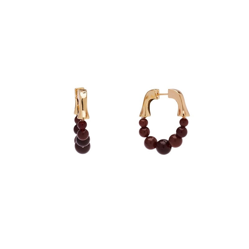 Phoebe hoops i forgyldt messing fra Pico Copenhagen, 29 mm hoops med espresso-brune kugler.