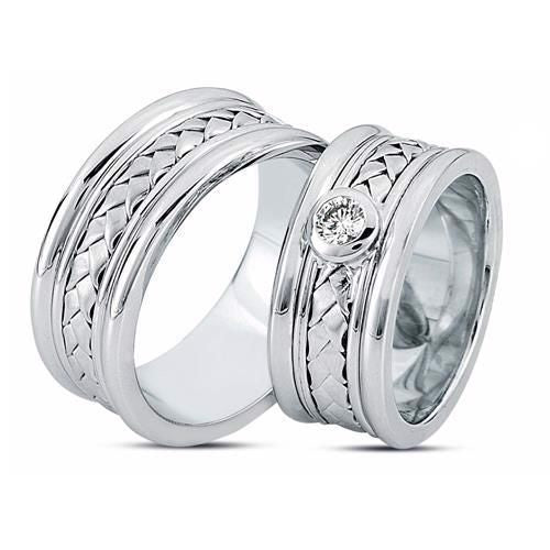 Moderne Nuran vielsesringe i 14 karat hvidguld med 0,20 ct diamant og fletmønster