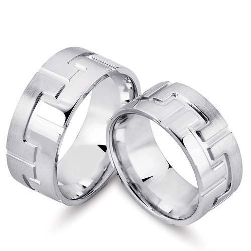 Unikke Nuran vielsesringe i rhodineret sølv med grafisk mønster