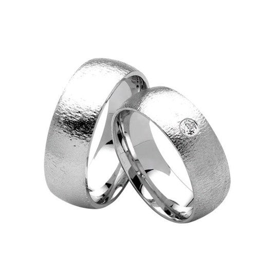 Stilfulde Nuran vielsesringe i rhodineret sølv med 1 zirkonia