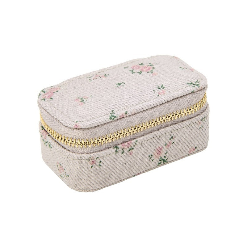 Pico Copenhagen Pico lille smykkeskrin i taupe flower med floral mønster og guldfarvet lynlås.