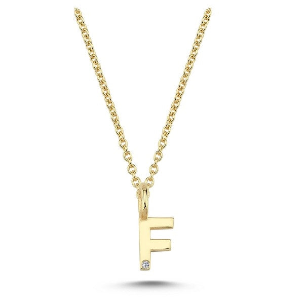 Nuran bogstavsvedhæng i 14 karat guld med diamant 6,5 mm