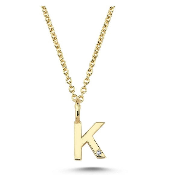 Nuran bogstavsvedhæng i 14 karat guld med diamant 6,5 mm