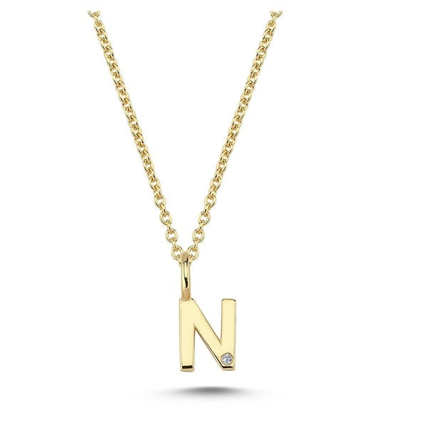 Nuran bogstavsvedhæng i 14 karat guld med diamant 6,5 mm