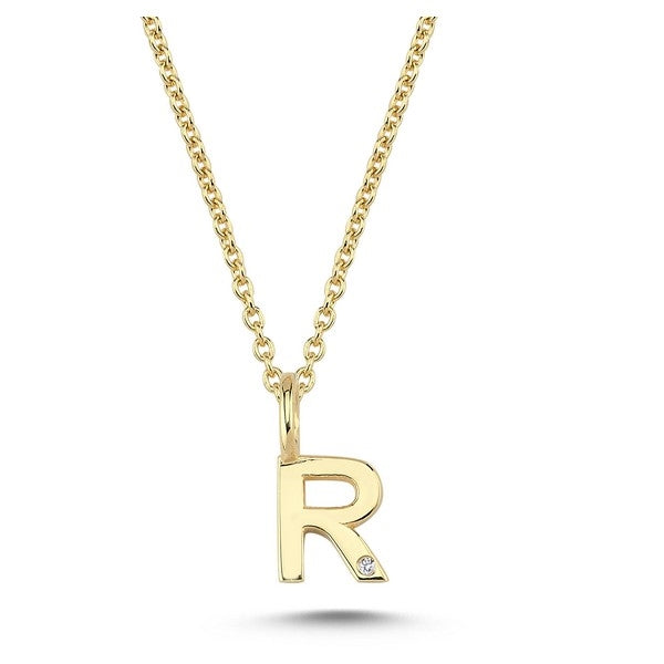 Nuran bogstavsvedhæng i 14 karat guld med diamant 6,5 mm