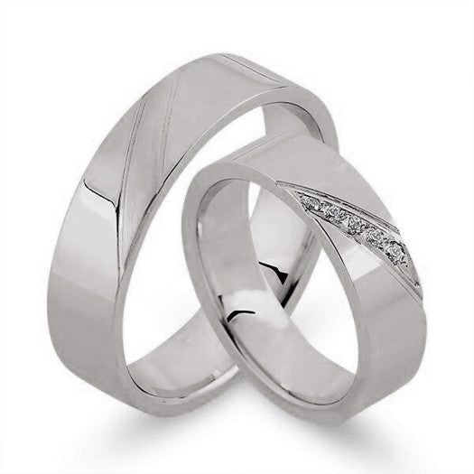 Fortryllende Nuran vielsesringe i 14 kt hvidguld med 0,07 ct diamanter – grafisk og elegant design.