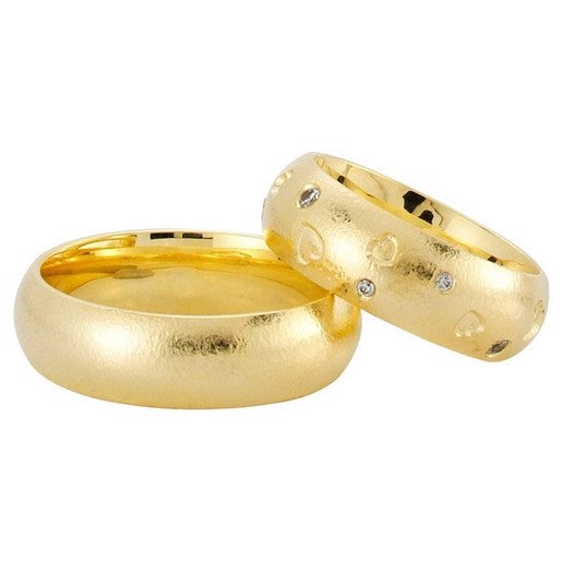 Unikke Nuran vielsesringe i 8 eller 14 kt guld med hjerter og 0,10 ct diamanter.