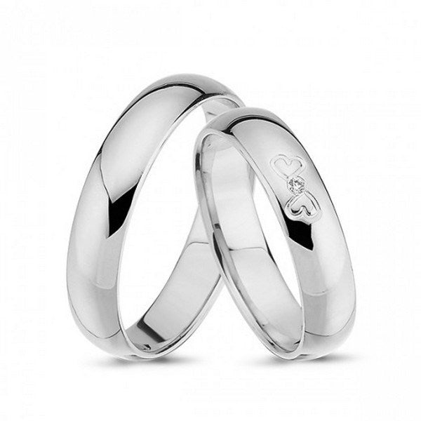Nuran Smukke vielsesringe i 14 kt hvidguld med 0,01 ct diamant og to hjerter, herre- og damering.