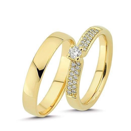 Smukke Nuran vielsesringe i 14 karat guld med 29 diamanter i samlet 0,28 ct fra Smykkecenter.