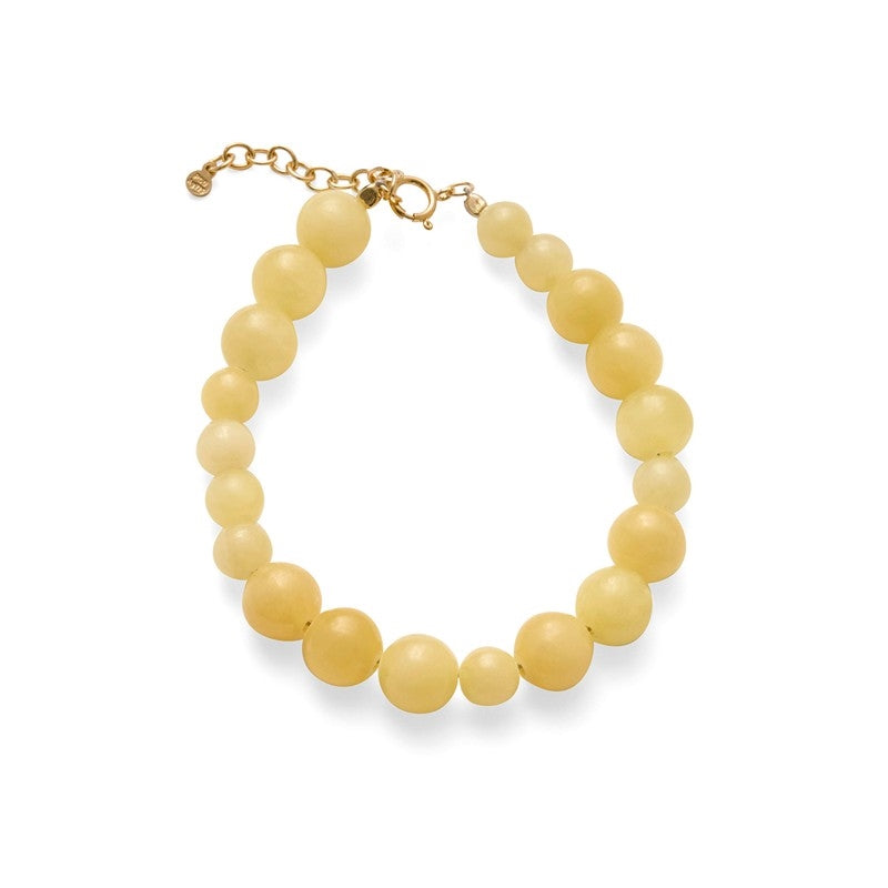 Pernille Corydon Honey armbånd i forgyldt sølv med runde gule calcitsten, justerbart 16–19 cm.