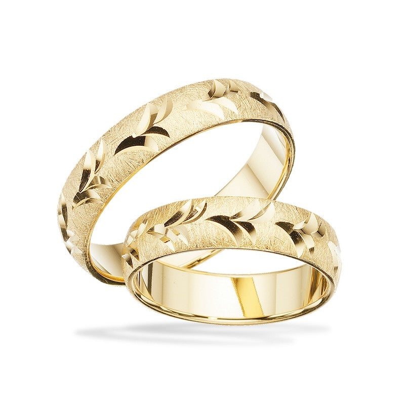 Unikke Scrouples vielsesringe i 8 eller 14 karat guld med rustik mønstret overflade, 5 mm brede.