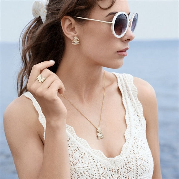 Piano vedhæng i 14 kt guld med 0,12 ct diamanter – Nuran